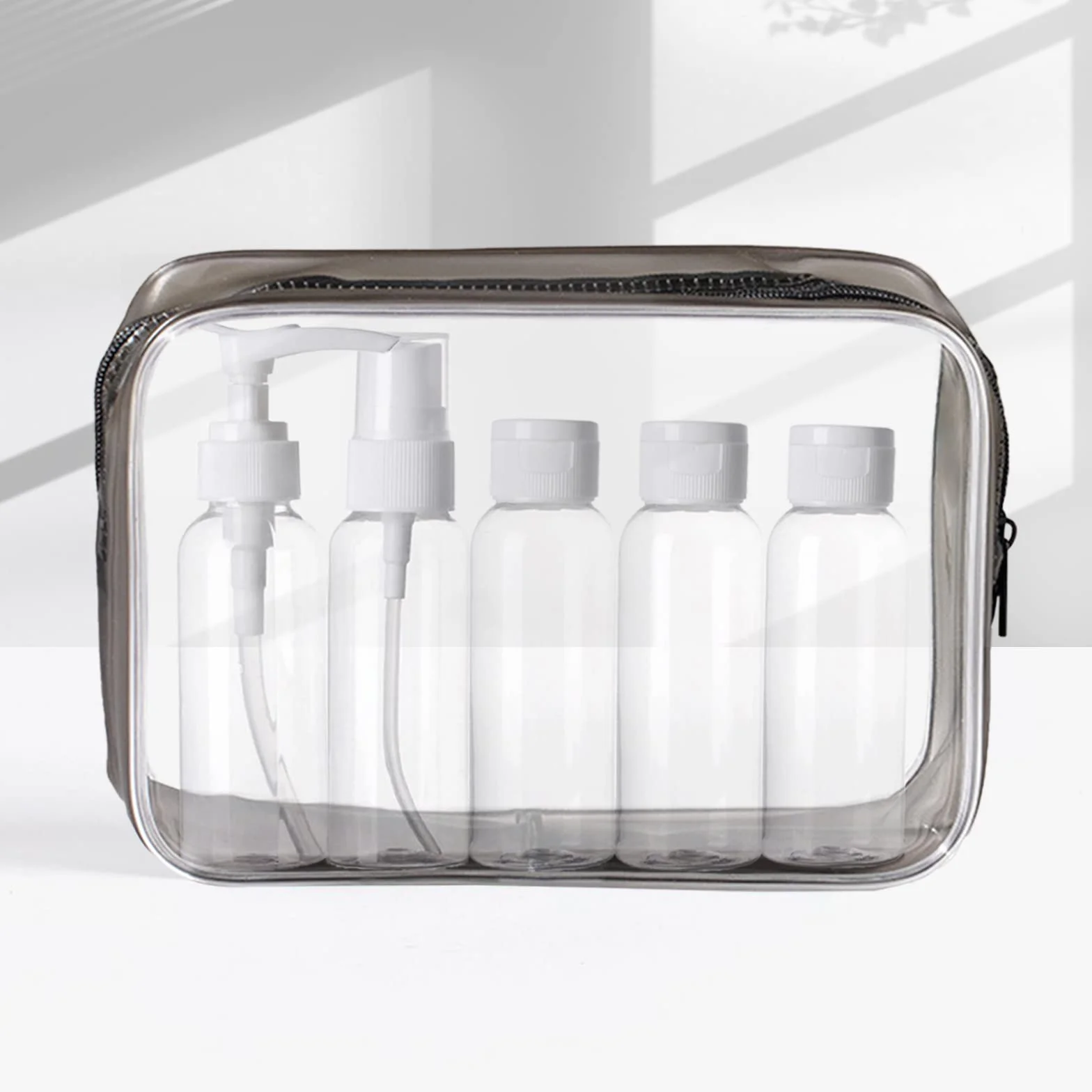 KEYRI 5 Piezas Botes Viaje Rellenables 100ml Kit Avion Prueba de Fugas Botellas con Neceser Transparente Negro
