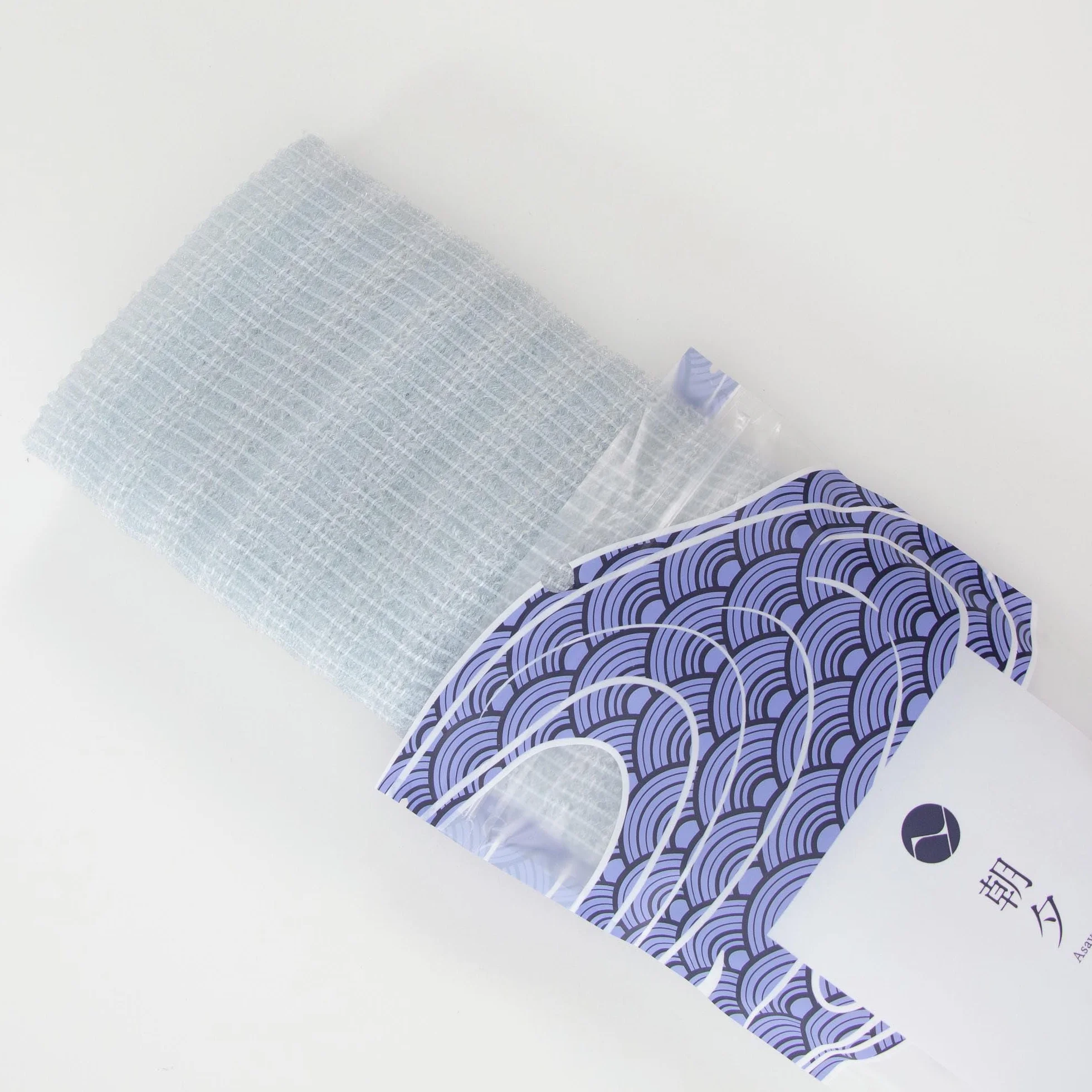 Toalla Exfoliante Corporal Asayu Japan de Nailon con Tejido Ondulado de Triple Trama