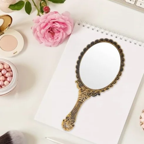 Espejo de mano vintage bronce para maquillaje y viaje