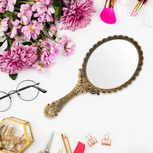 Espejo de mano vintage bronce para maquillaje y viaje