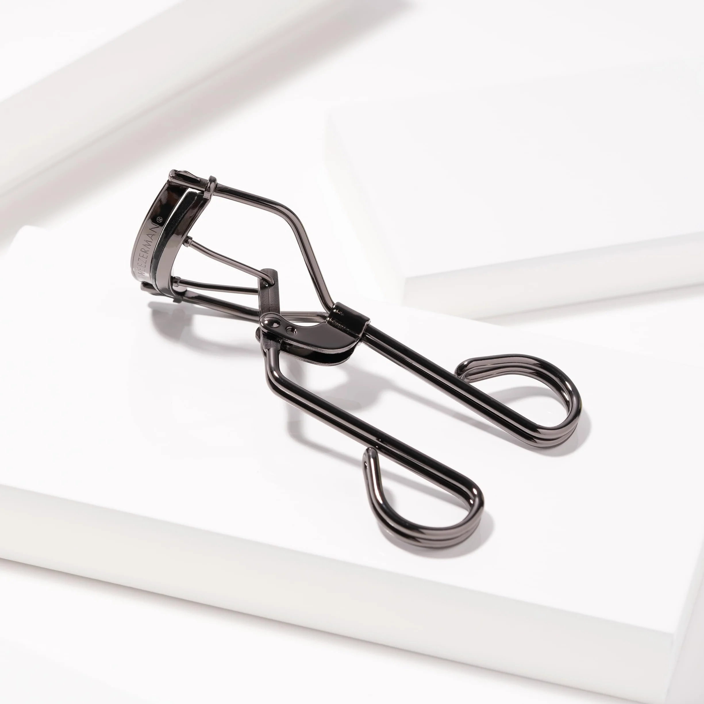 TWEEZERMAN Rizadores de pestañas ProCurl & ProMaster (para ojos redondos y almendrados, con 3 almohadillas de repuesto, acero inoxidable)