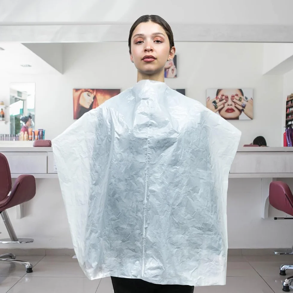 Areso Capas Desechables para Peluqueria 100 Unidades en Rollo, Capa de Plastico para Tinte de Pelo, Color Blanco