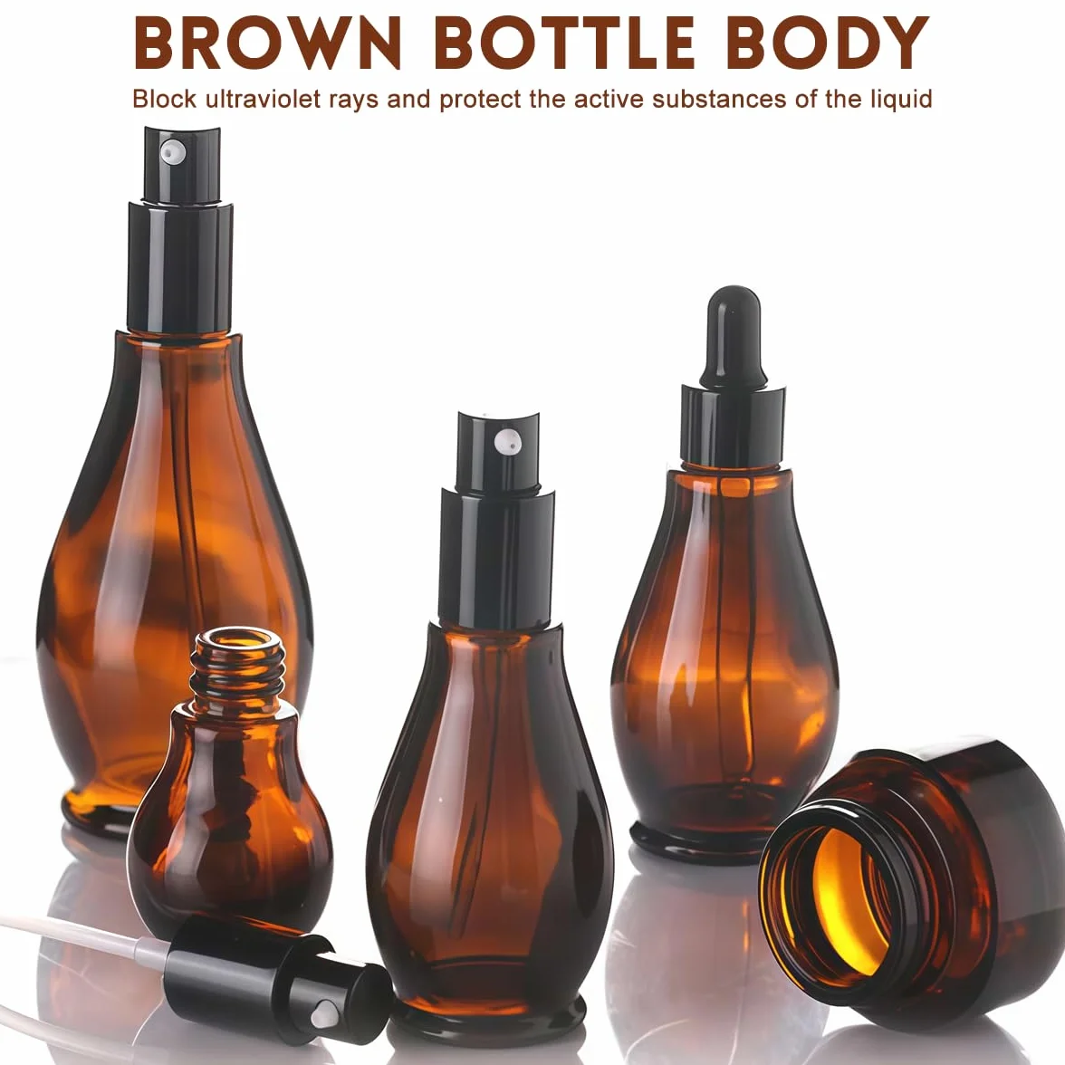 UPSTORE 2 botellas de cristal ámbar de 100 ml con dispensador de bomba de viaje con bomba negra para aceites esenciales, base, crema, champú, 2 unidades